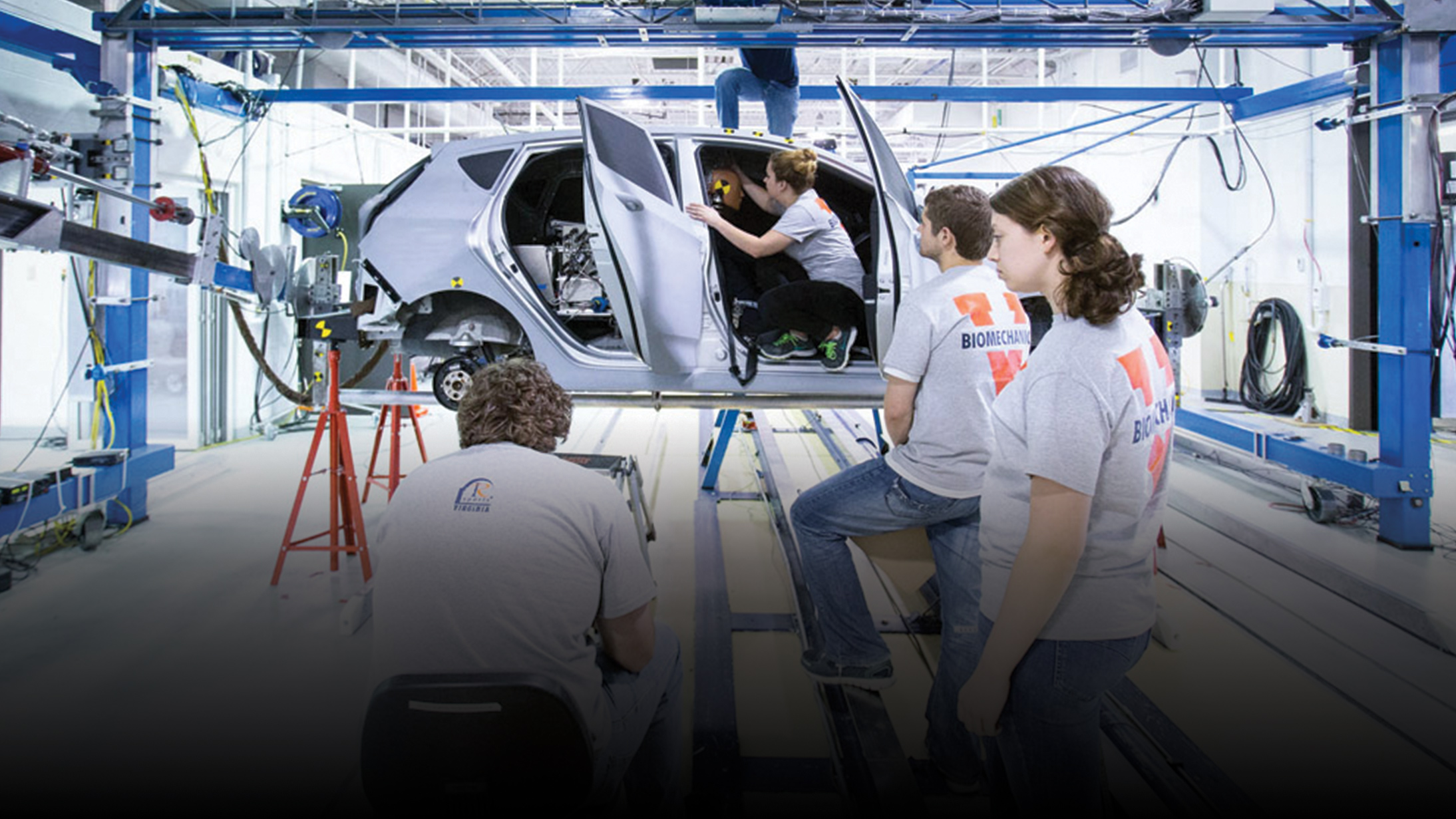 Portrait of a UVA engineering student testing a car safety feature.